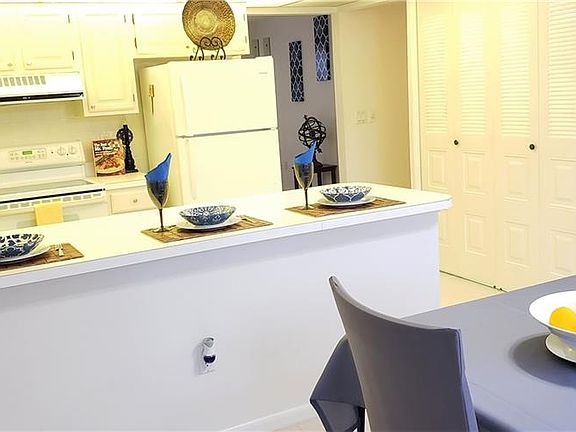 4th image of 6890 Sandtrap Dr APT 1