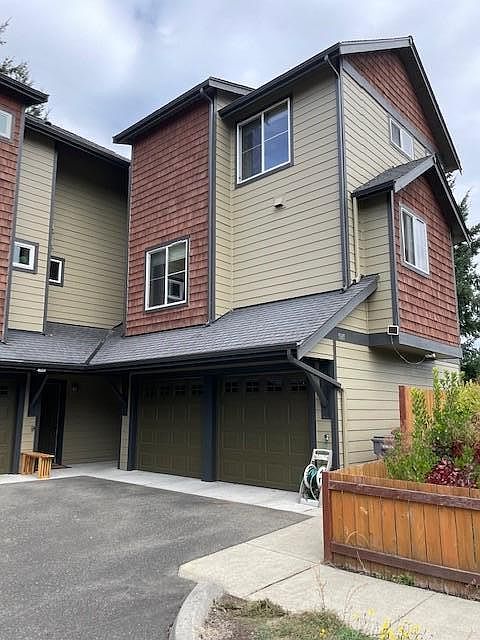 Front entry - new fence installed since photo. Two car garage (side by side)