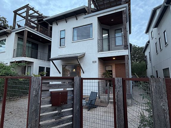 Front of home off 12th St. Small fully enclosed yard space.