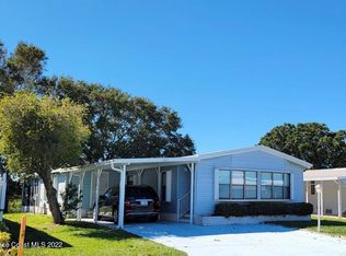 445 Papaya Cir, Barefoot Bay, FL 32976