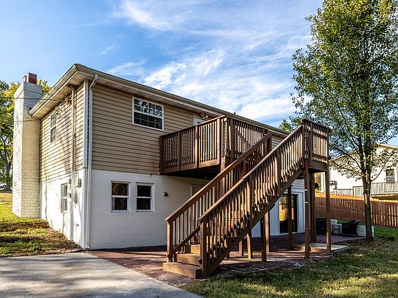 Stairs allow access to the grilling deck above