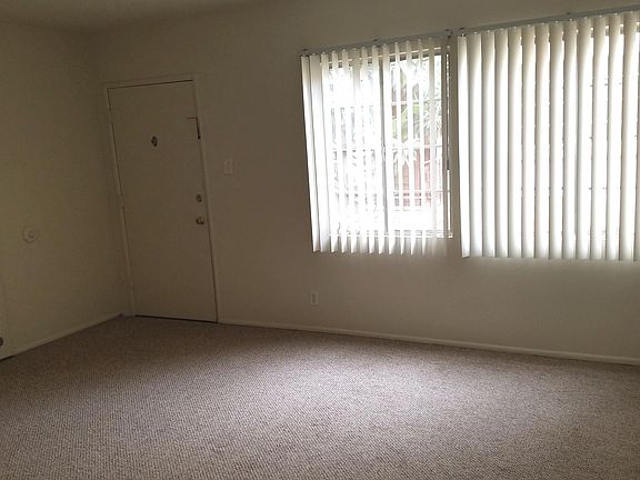 Living Room looking into it from the kitchen transition area