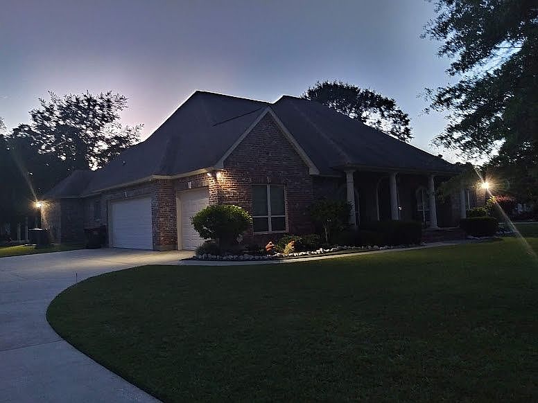 Left front & driveway
