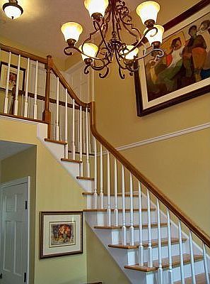 Grand formal entry w/stunning two story foyer and gleaming hardwood floors.
