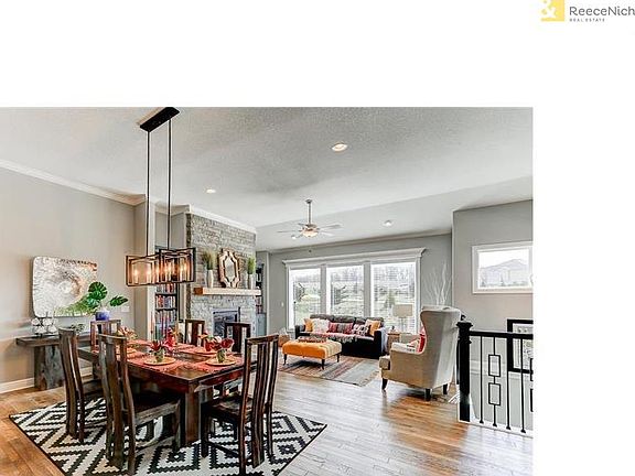 Dining area flows between the kitchen and the great room.