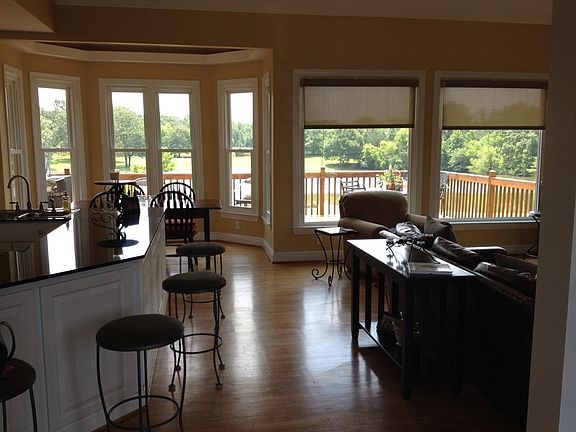 View from front door with natural light and views of lake.