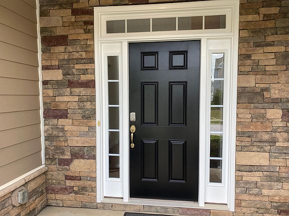 Covered front porch with digital keypad deadbolt
