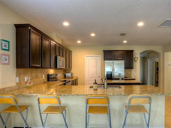 5th image of 7846 Tuscany Woods Dr