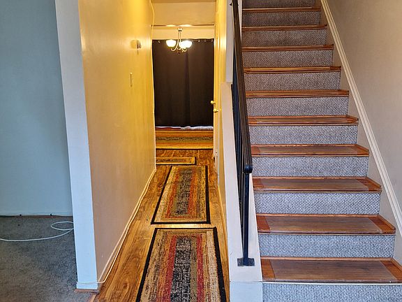 Entrance to Living Room & Formal Dining w/ crown molding