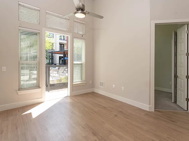 Living Room with Balcony and Hard Surface Flooring