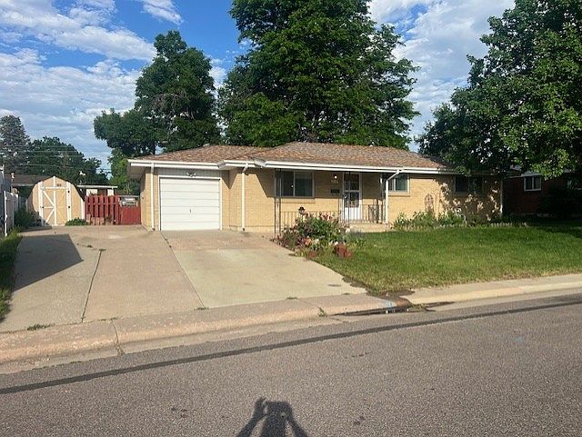 large concrete driveway for extra off street parking and storage