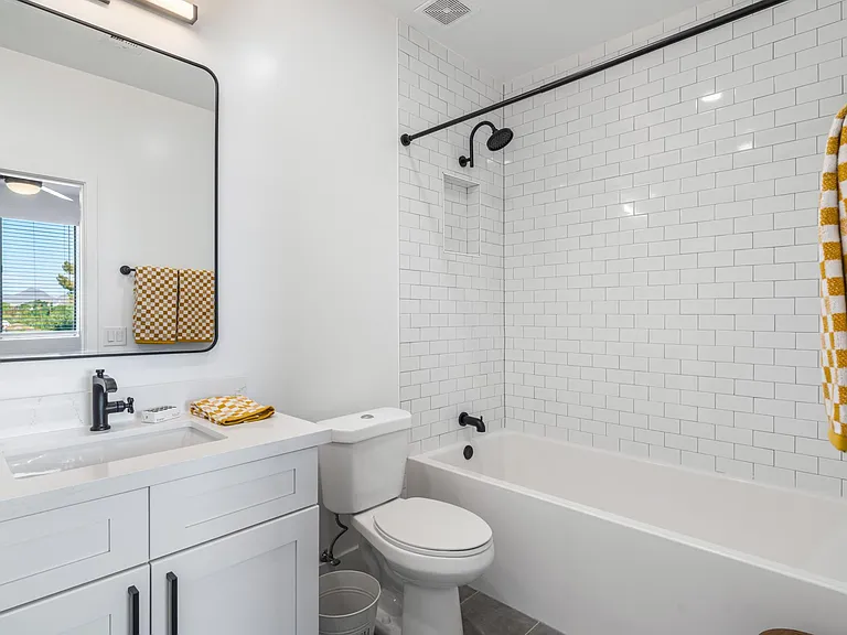 Large Bath Tub and White Tile