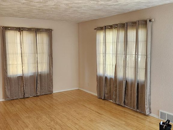 Living room with new drapes