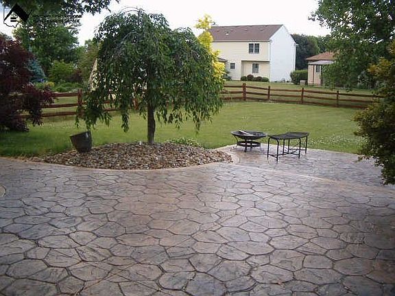 Stamped concrete patio off back of house