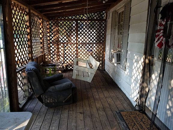 This is part of the wrap around porch that leads to the wash