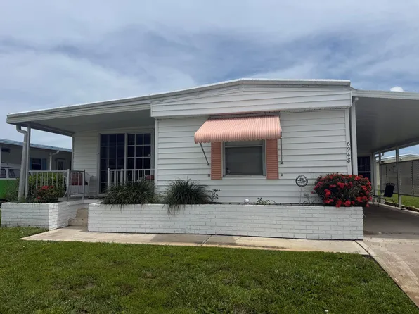 6948 SE DELEGATE Street, Hobe Sound, FL 33455
