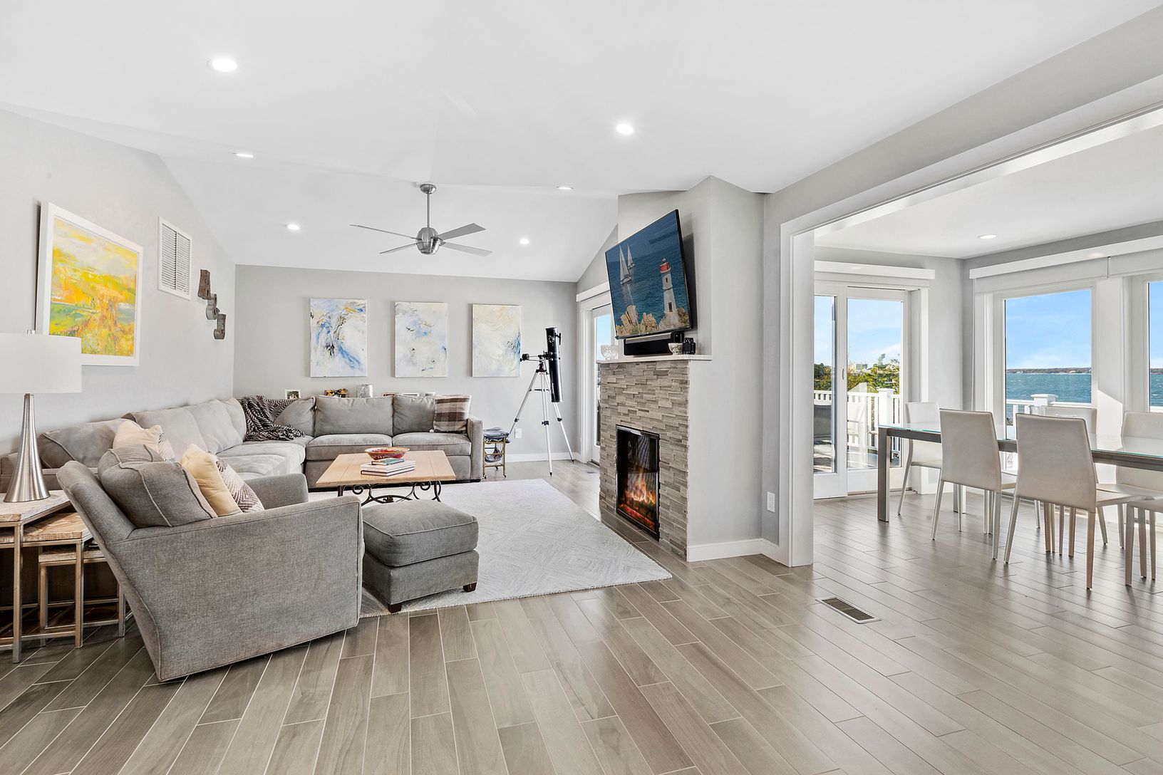 Living Space With Fireplace off the Dining Room with superb Vistas of the Bay