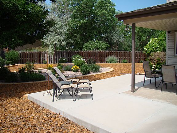Covered patio with extended concrete - lots of outdoor living space