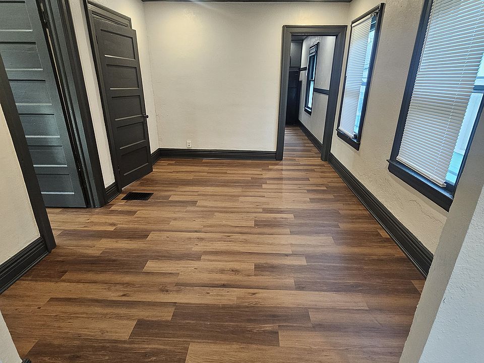 Dining Room with entry to Bedroom 1 and Bathroom