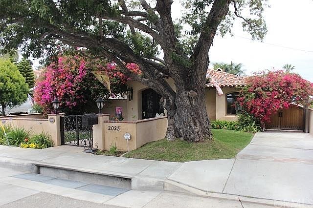 Stunning Mission Style Villa located on private cul de sac street