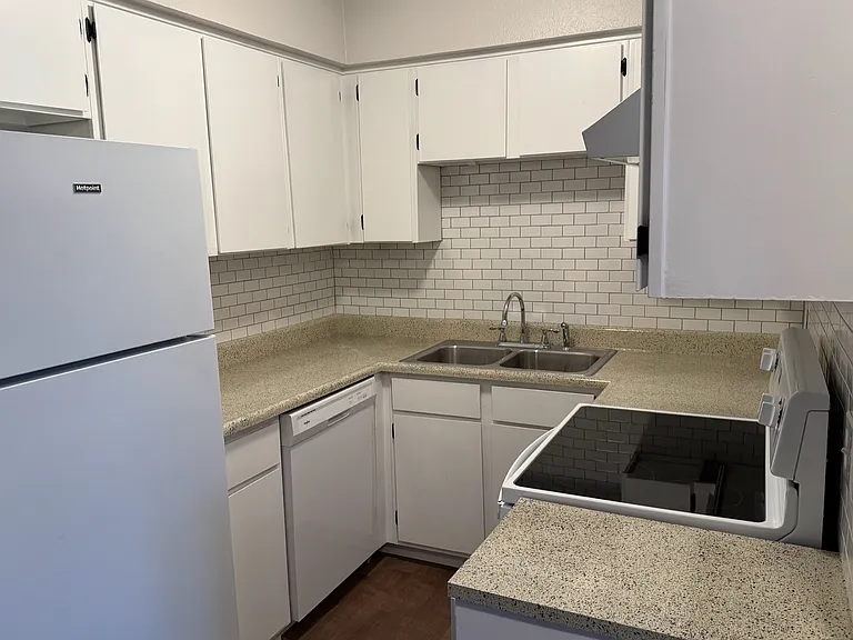 Renovated Kitchens feature fresh cabinet paint, new hardware & fixtures, new tile backsplashes, resurfaced counters & updated appliance packages.