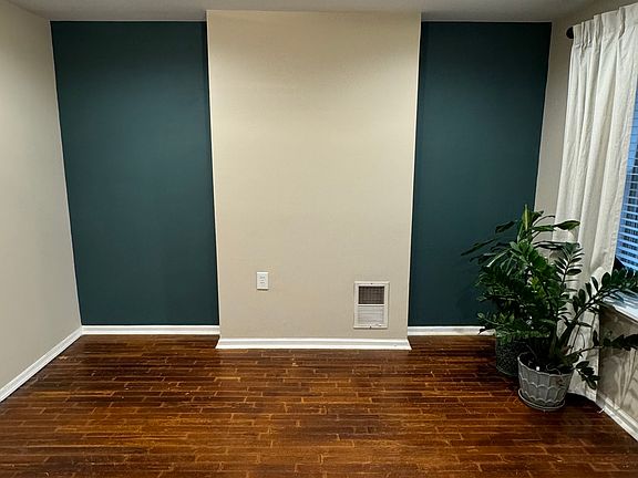 Spacious living room with accent wall