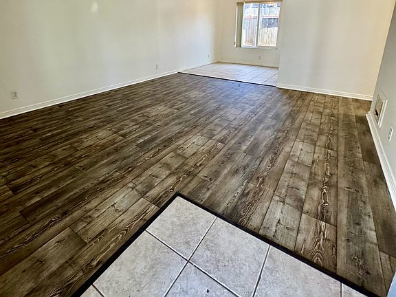 View from entrance into living room and dining room