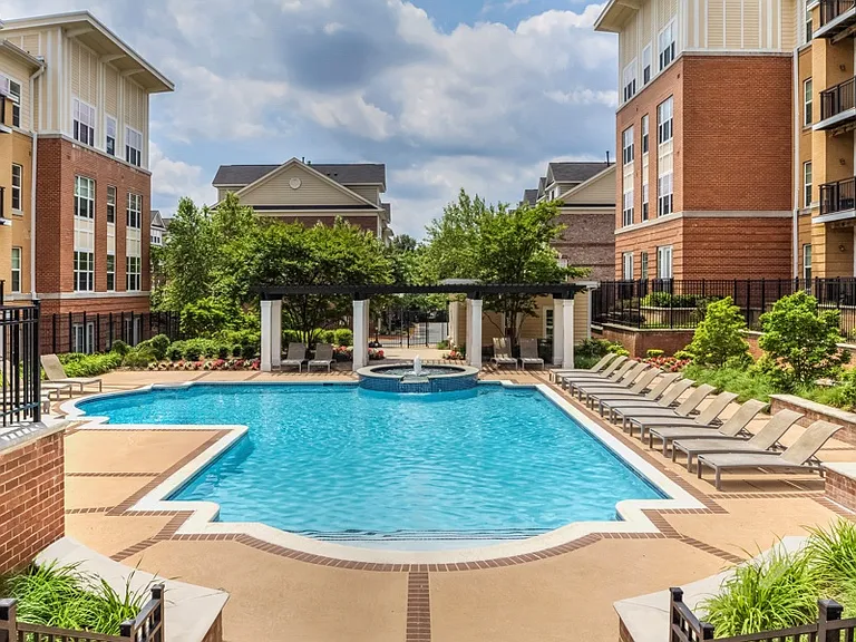 Swimming pool and fountain with expansive sundeck