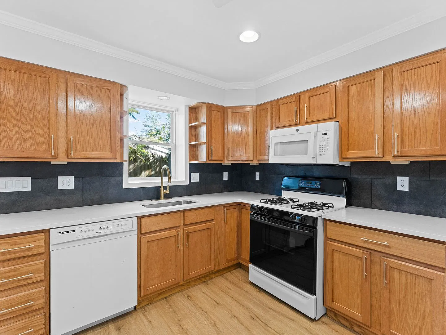 Charming 3-Bedroom Ranch Home with New Flooring, Fresh Paint & Central Air! — Photo 1