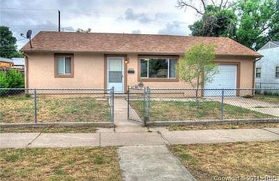 Front view 2 bedroom 1 car attached garage stucco