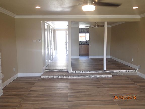 View of front entryway, dining room, and part of living room