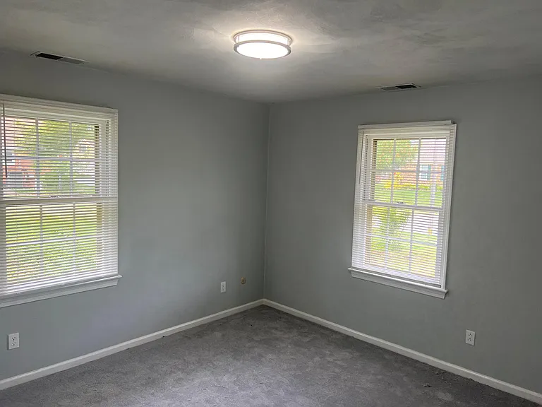 Light filled spacious 2nd bedroom with dual window.