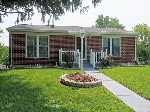 Nicely Landscaped, white vinyl fencing, new windows, new storm door, freshly painted.