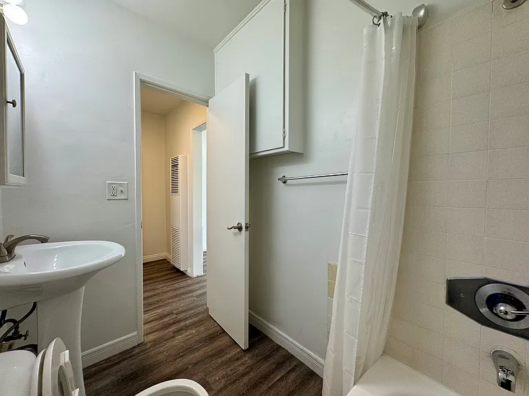 All photos are actual photographs of a comparable unit with a similar floor plan and finish style, shown for reference only.