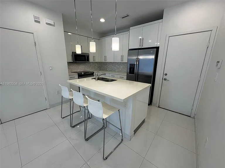 2630 NE 213th St #105 — Photo 3