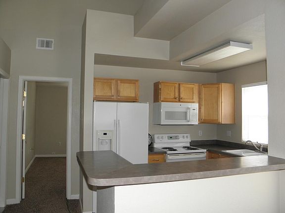Kitchen
laundry room to left of open door
Open door leads to master suite
