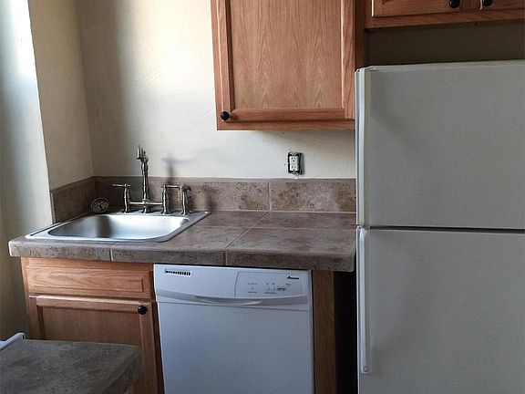 Kitchen with dishwasher and microwave