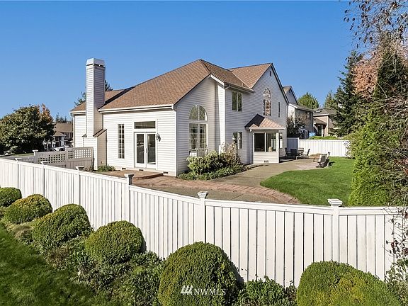 Mature landscaping and unique plantings.