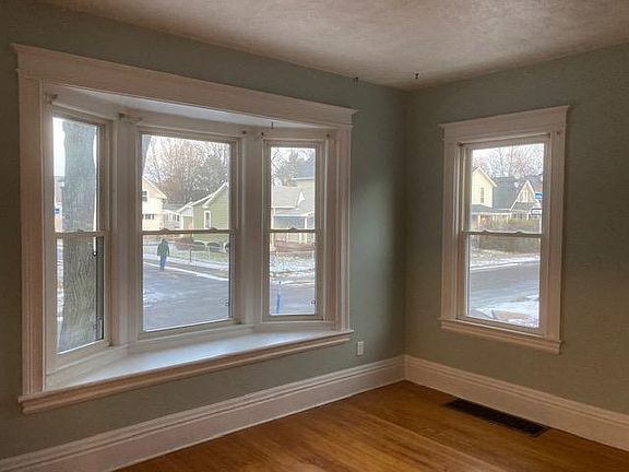 Spacious living room with large windows