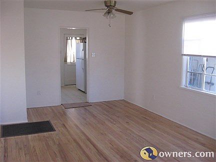 Ceiling fan circulates heat from the floor furnace.