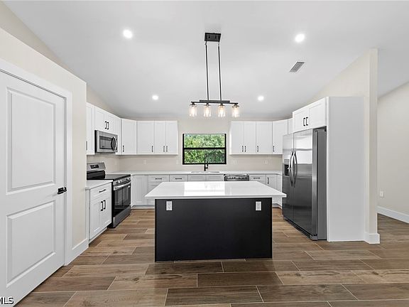 5th image of 6156 Hughes Ave