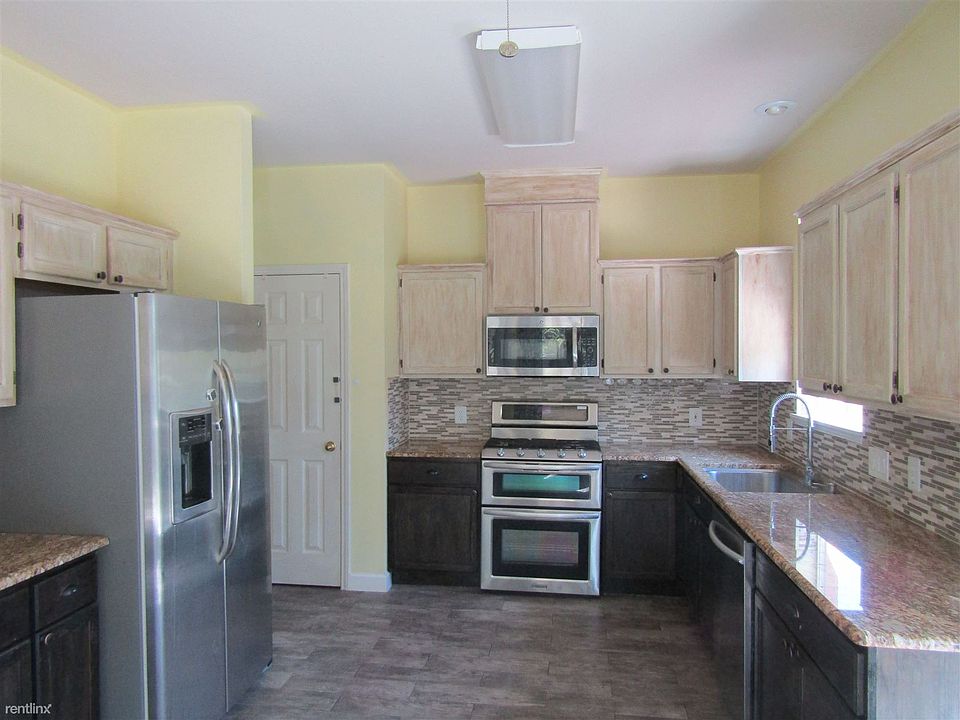 Great kitchen with stainless appliances and granite counters