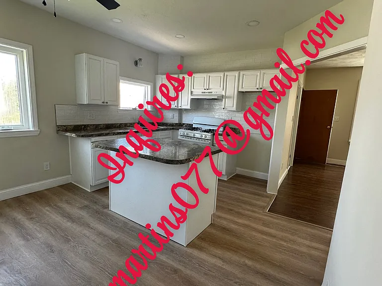 Eat-in kitchen with mobile island. Fridge to be installed and photo to be updated. 
*Images are watermarked to protect against scams and unauthorized use*