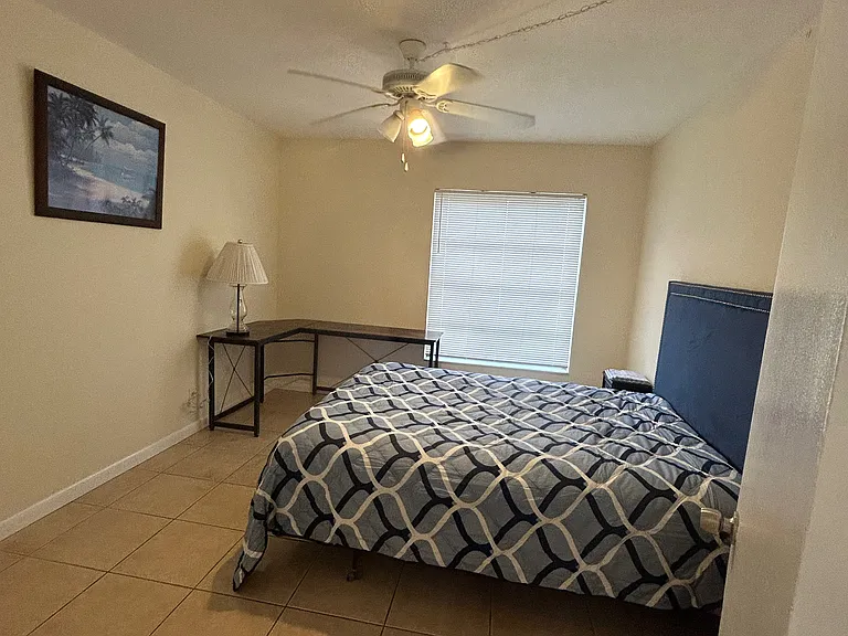 queen bed and desk