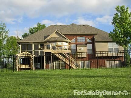 Rear Elevation : elaborate decks , porchs, and patios