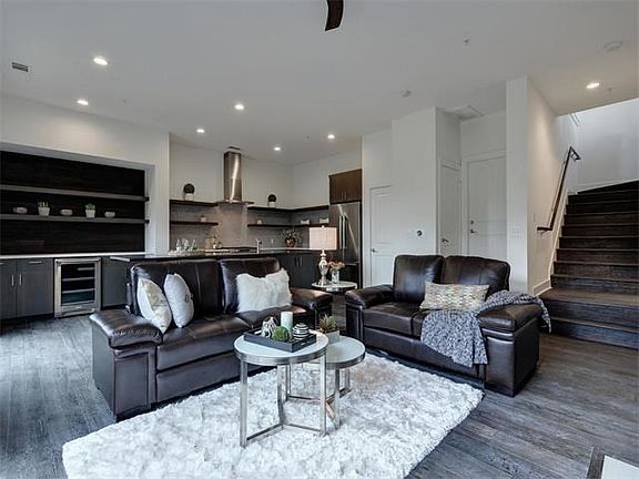 Kitchen and family room are spacious with high ceilings and open layout. Hardwoods carry straight into the kitchen!