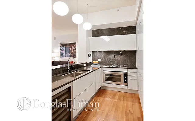 Sold by Douglas Elliman | media 17