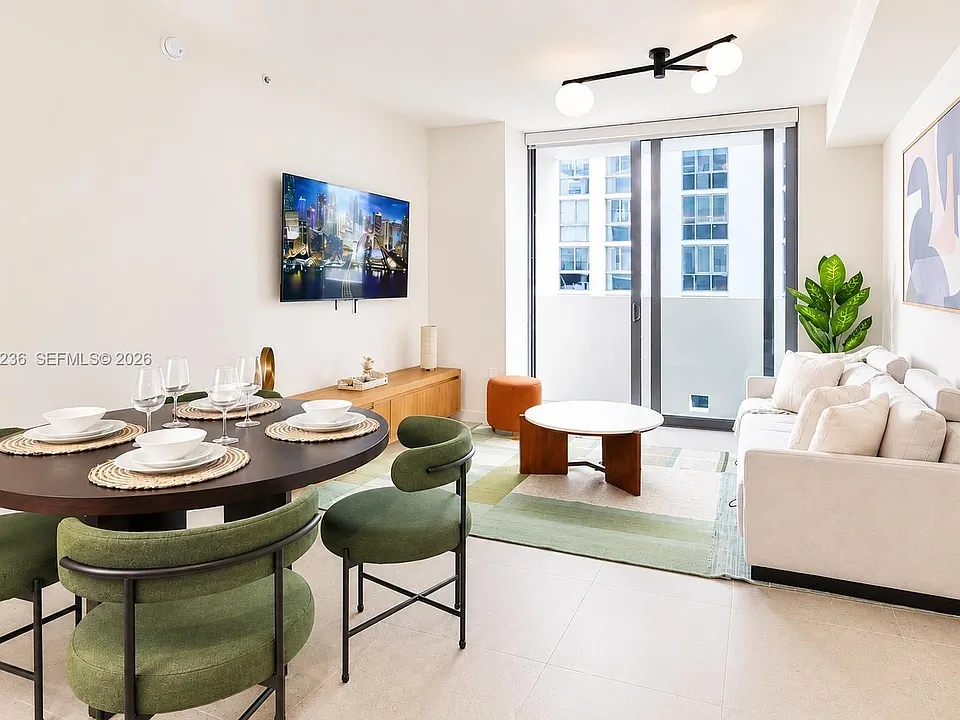11 NE 6th St #212