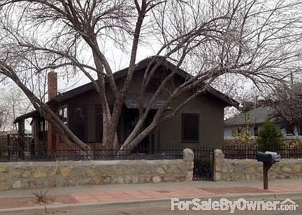 Front of house.
						:
						Side entry to basement living area is located on this side of the house