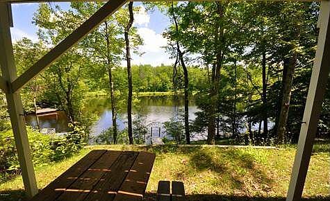 A picnic table sits on the patio